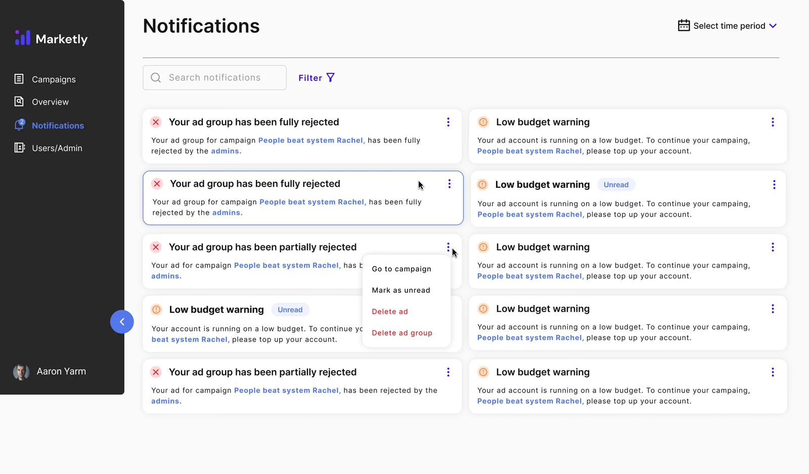 The notifications page as a two-column grid of cards for fully rejected and partially rejected ad groups and a low budget warning, some marked Unread, one with its menu open showing Go to campaign, Mark as unread, Delete ad and Delete ad group
